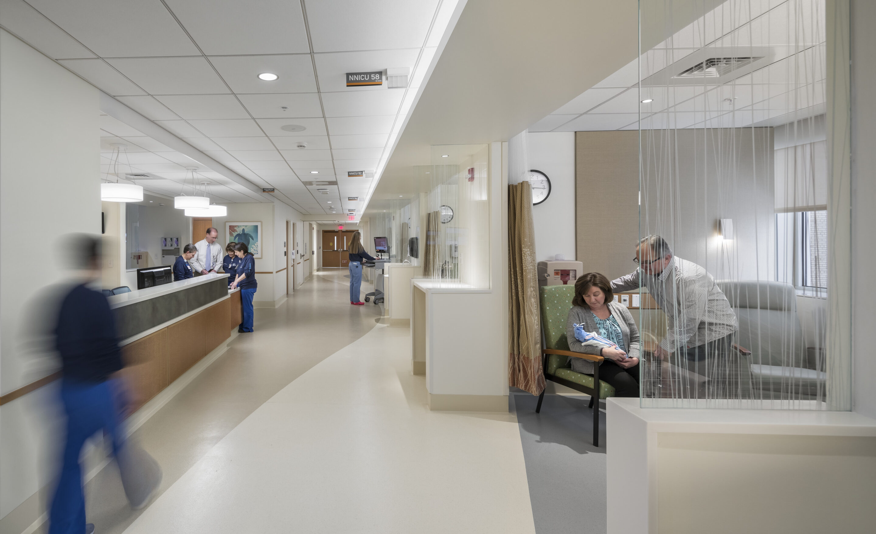 University of North Carolina Wilmington Library interior with flexible comfortable seating and natural light from floor to ceiling windows
